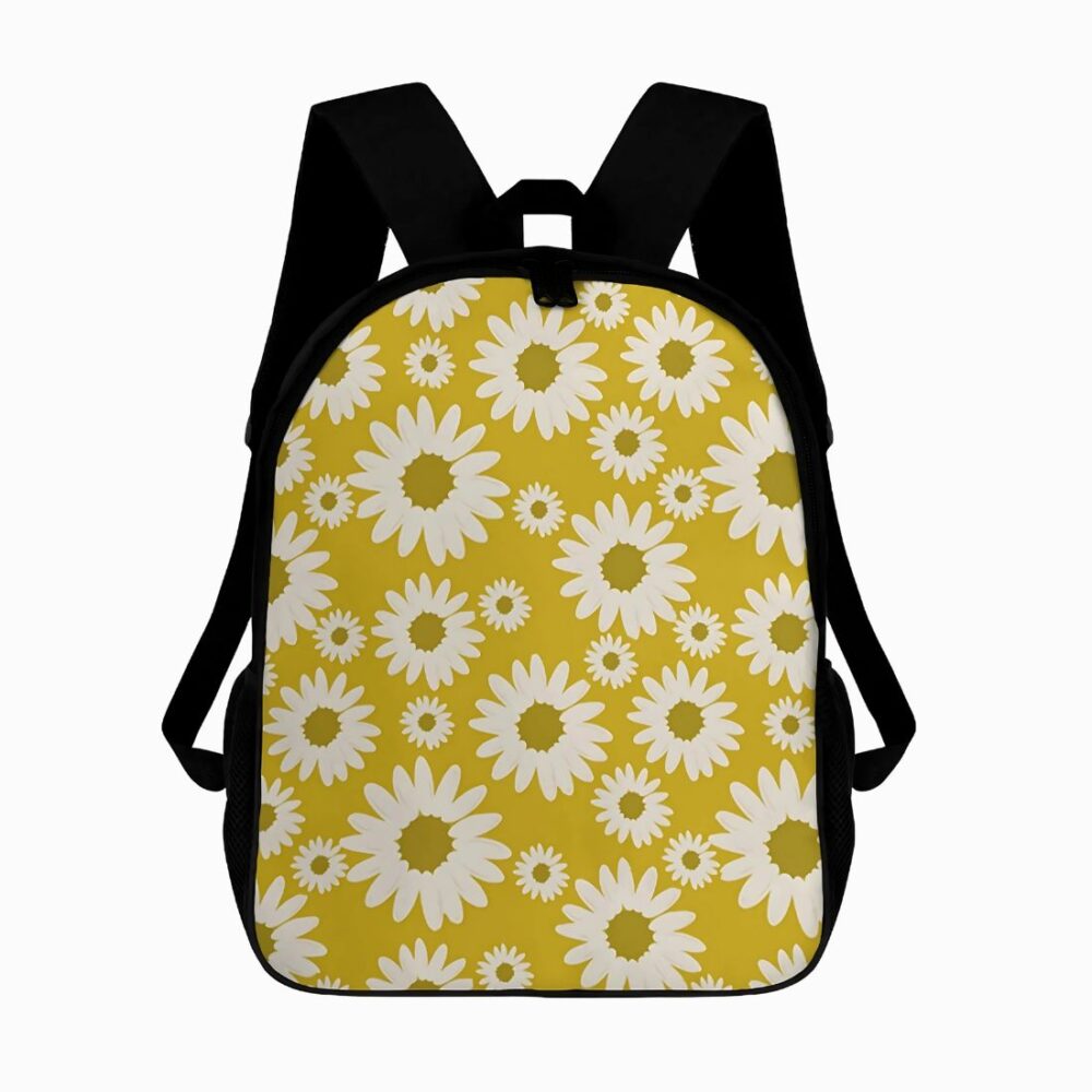 Cartable primaire jaune avec marguerites blanches sur fond jaune. Bretelles noires rembourrées. Sur fond gris clair.