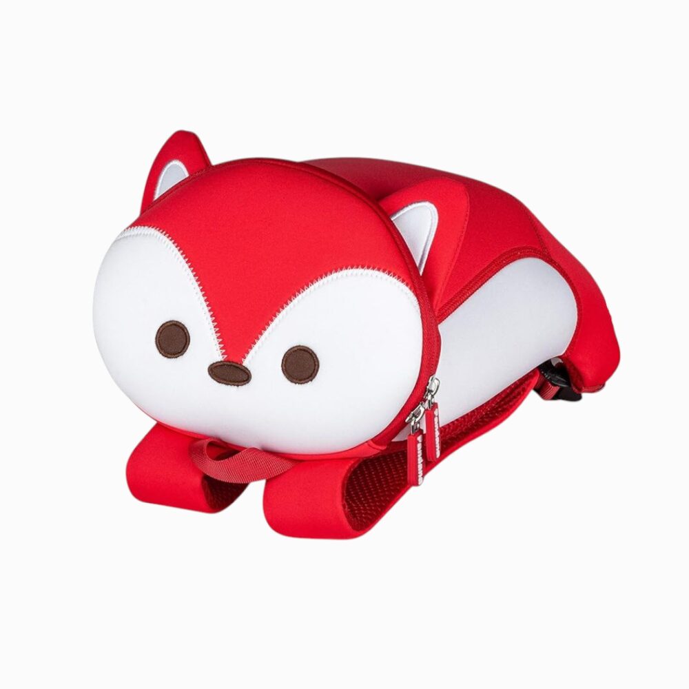 Cartable enfant en néoprène rouge vif en forme de renard couché, avec museau blanc et oreilles pointues, sur fond blanc