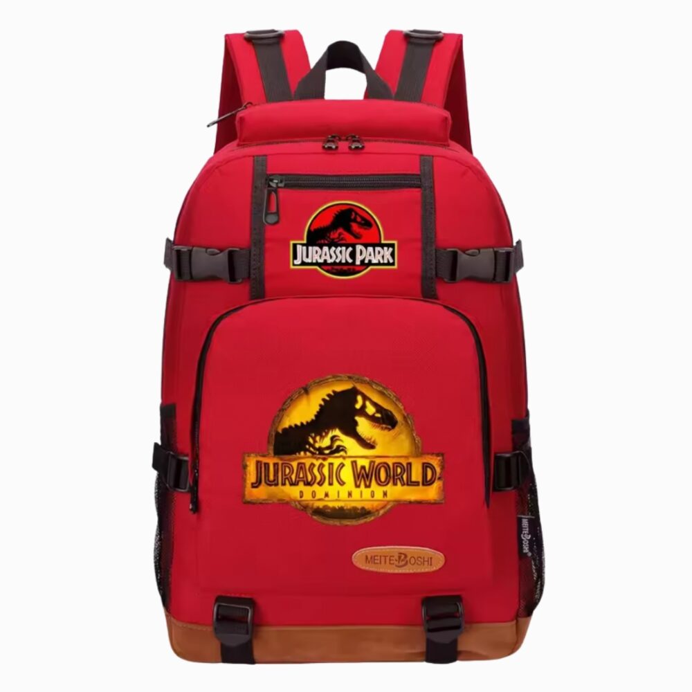 Un cartable Jurassic World à grande capacité rouge avec bretelles noires, poche avant et logos de dinosaures, posé sur fond blanc.