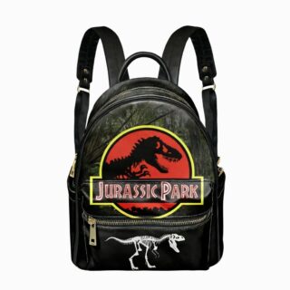 Un cartable Jurassic Park aspect vintage simili-cuir noir, avec un grand logo de dinosaure rouge et jaune et une petite silhouette de squelette en bas, posé sur fond blanc.