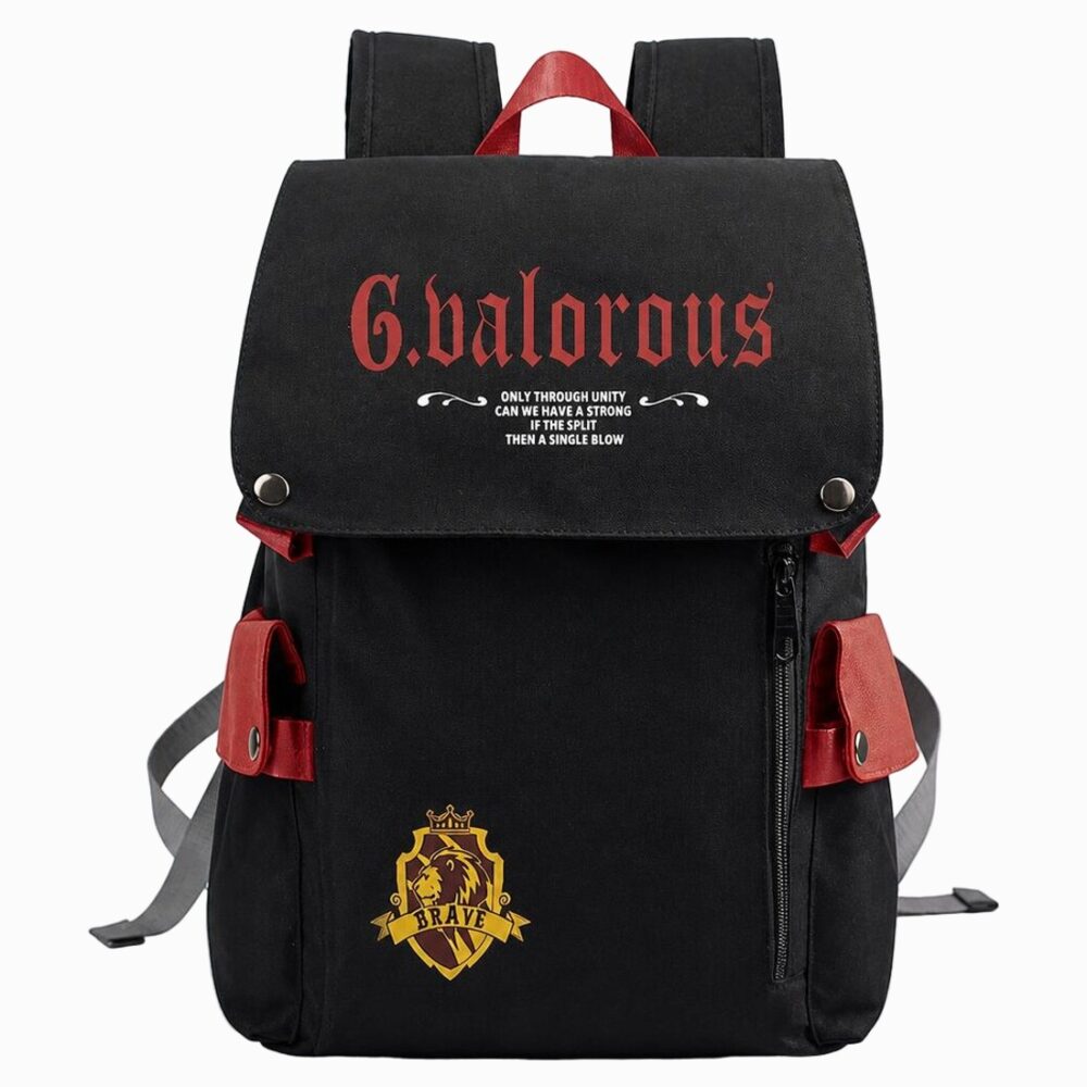 Un cartable Harry Potter aux couleurs de Gryffondor noir et rouge, avec logo jaune de lion, posé sur fond blanc.